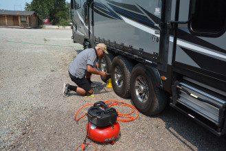 We Have Our First Ever Flat Tire on the Road Between Seeley Lake and West Glacier, Montana