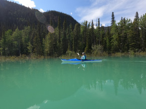 Wayne and Lisa Kayak on Muncho Lake, British Columbia